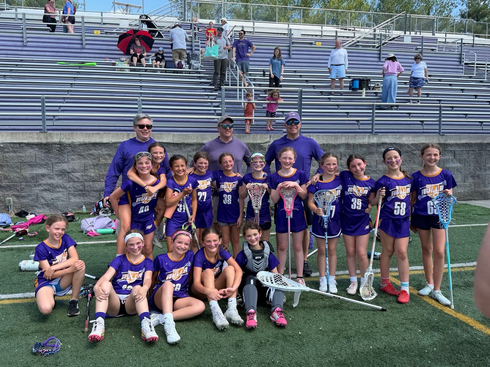 RVLA girls team on the field with coaches